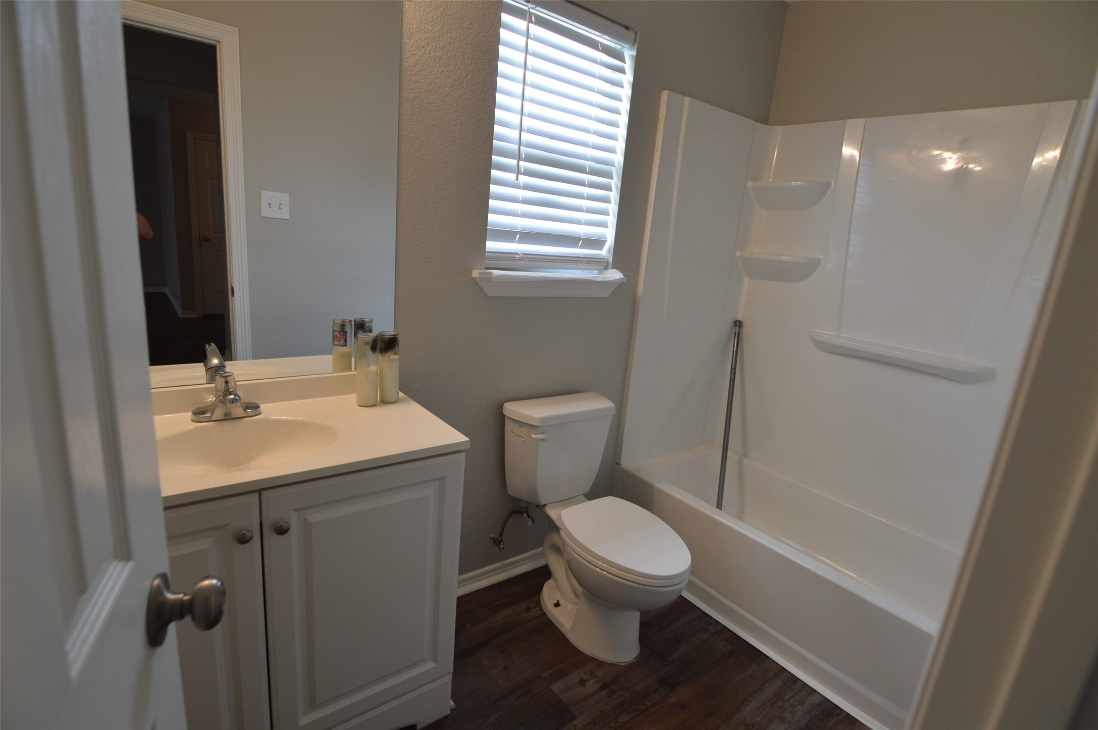 24131 Bar Kay Lane Hockley, TX 77447 - Photo 7 of 14 a bathroom with a sink toilet and shower