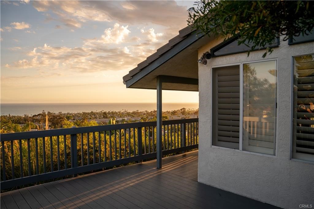 128 Avenida Trieste San Clemente, CA 92672 - Photo 14 of 14 a view of a roof deck with wooden floor and fence