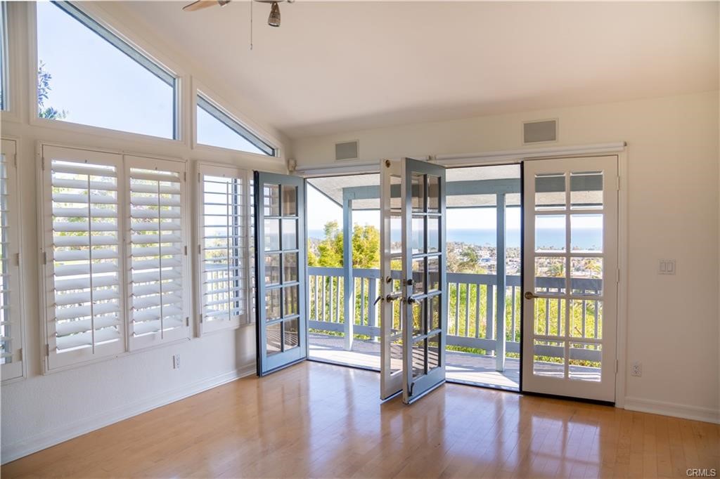 128 Avenida Trieste San Clemente, CA 92672 - Photo 2 of 14 a view of entryway with wooden floor