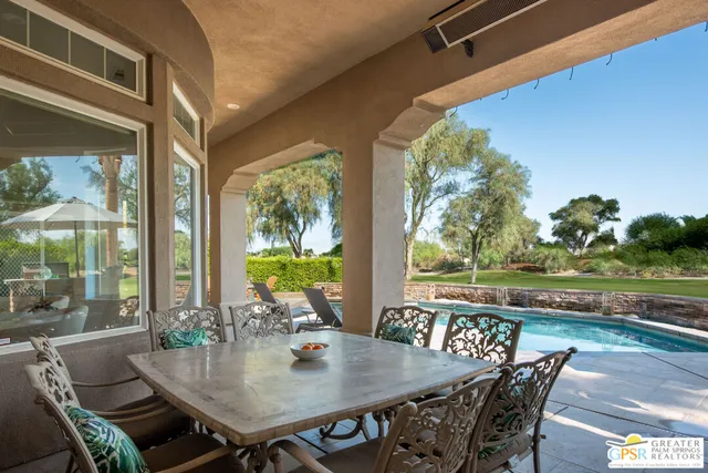 a view of an outdoor space with furniture