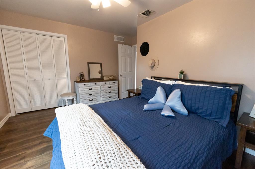 3205 42nd Street Snyder, TX 79549 - Photo 12 of 31 a living room with furniture and a wooden floor