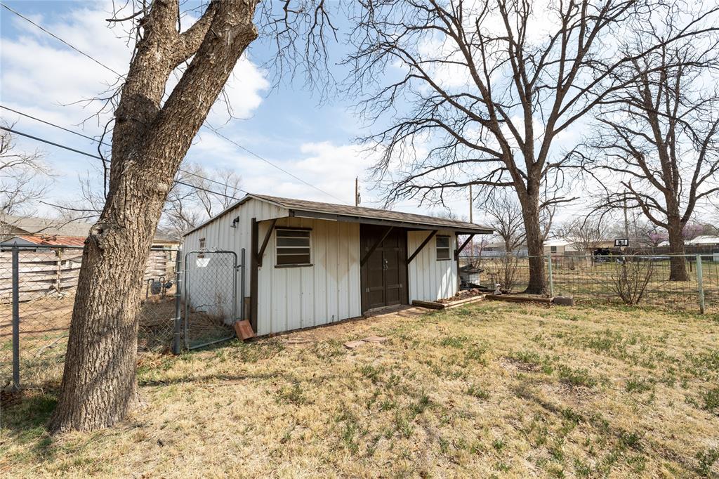 3205 42nd Street Snyder, TX 79549 - Photo 28 of 31 a view of a house with a snow in the yard
