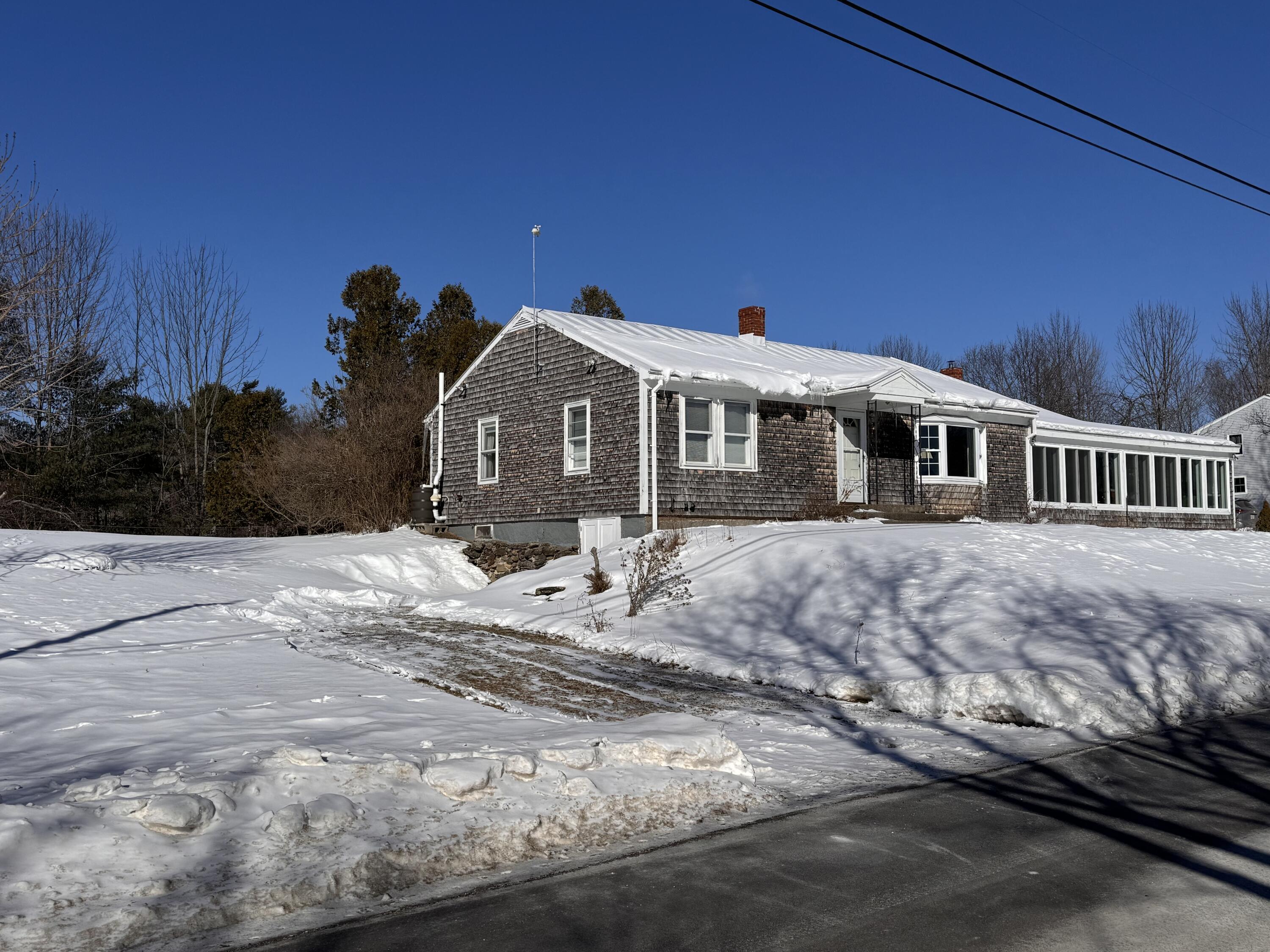 679 Neck Road China, ME 04358 - Photo 2 of 23 side yard with basement entrance