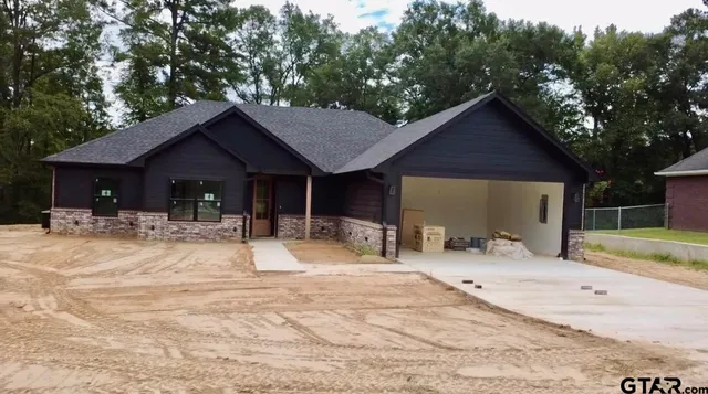 a house view with a outdoor space