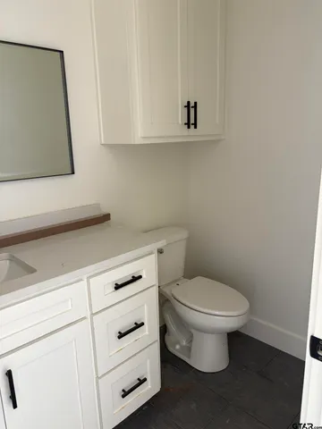 a view of swimming pool with a yard