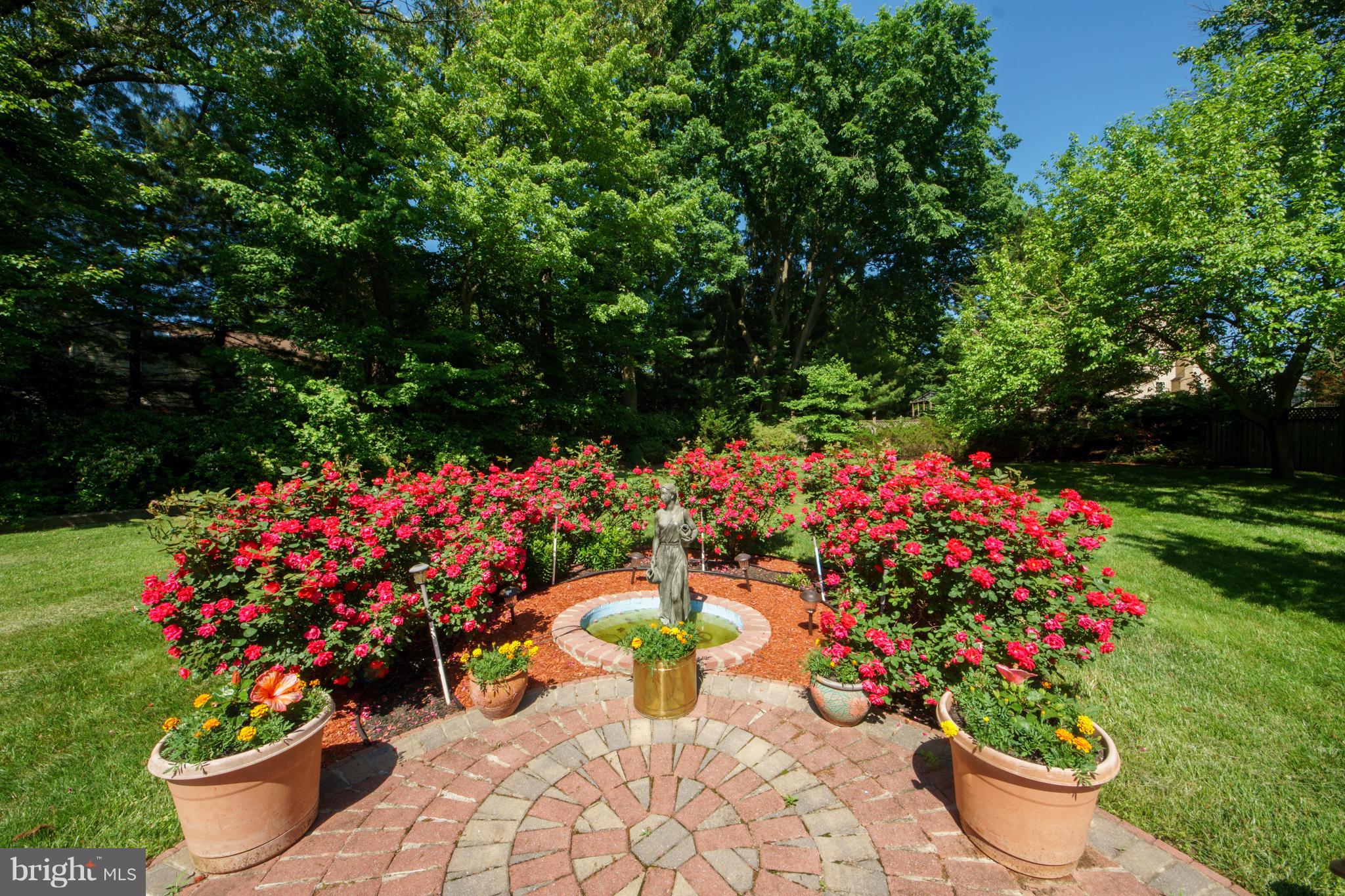 13905 North Gate Lane Silver Spring, MD 20906 - Photo 22 of 23 Landscaped rear yard w/ water fountain.