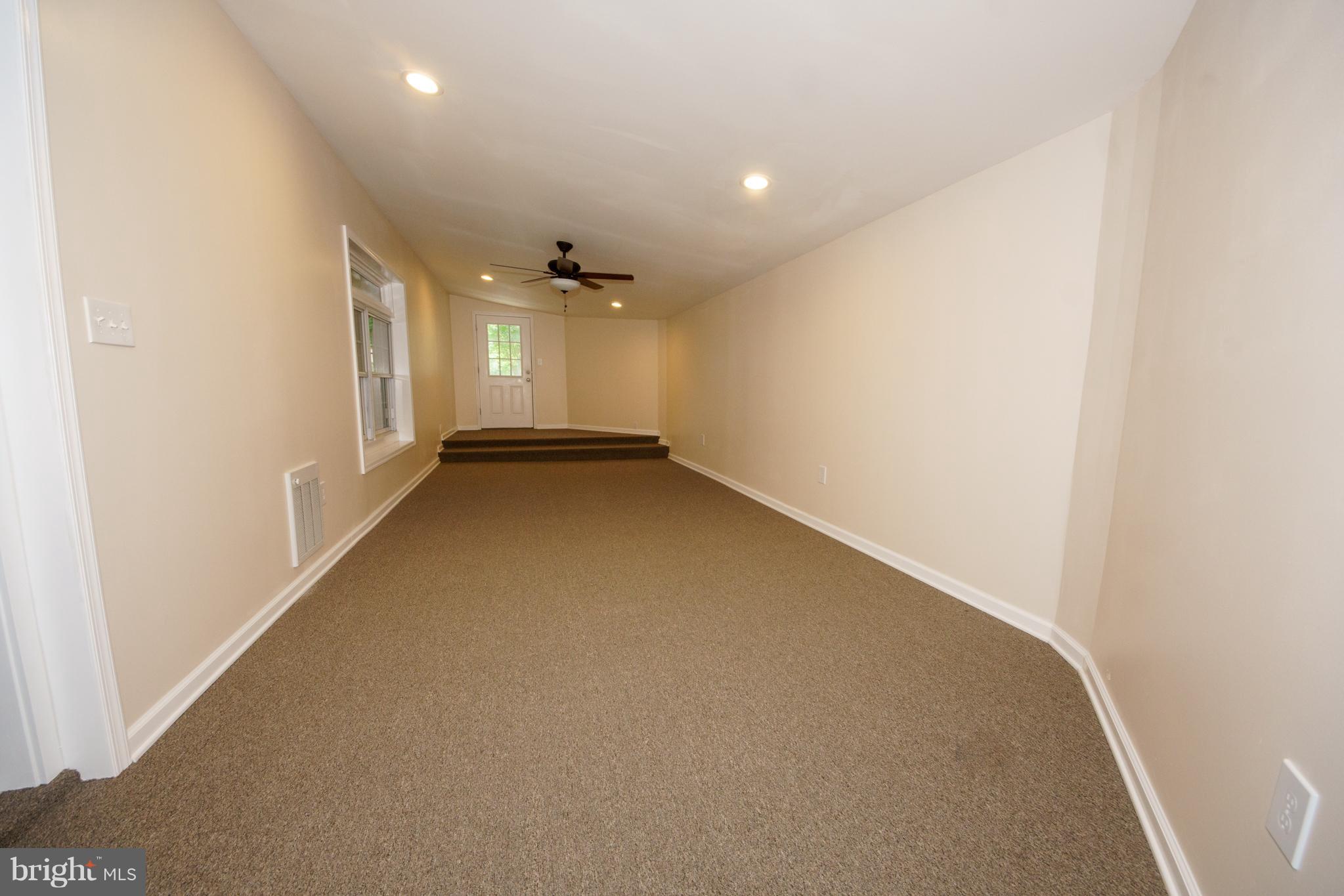 13905 North Gate Lane Silver Spring, MD 20906 - Photo 8 of 23 Card room w/ new w/w carpet.