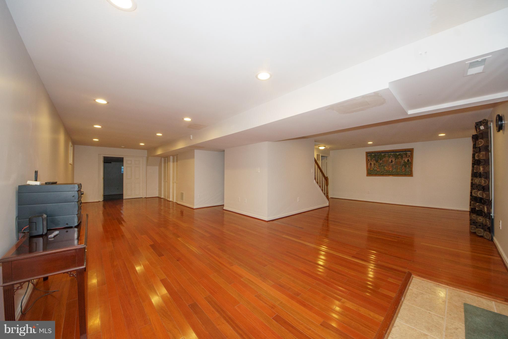 13905 North Gate Lane Silver Spring, MD 20906 - Photo 10 of 23 Large rec room w/ cherry hdwd floor.