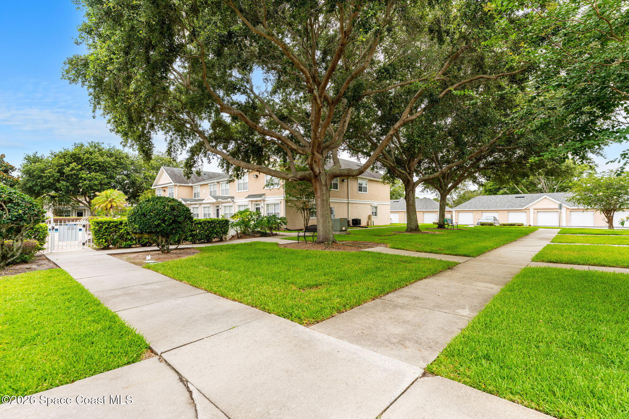110 Turpial Way, Unit 106 Melbourne, FL 32901 - Photo 49 of 50 a view of a park with large trees