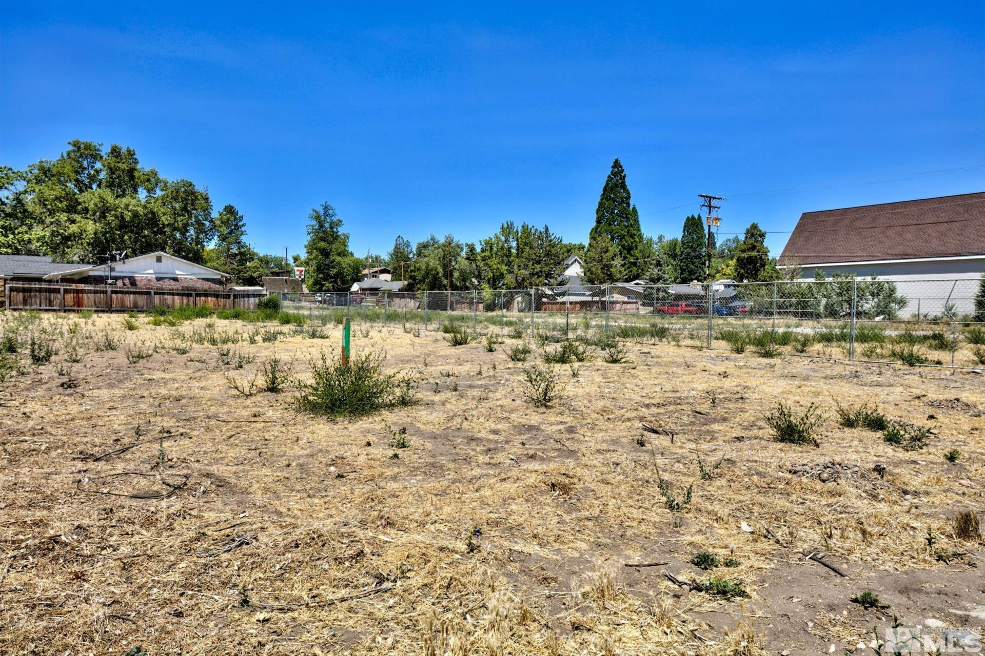 1587 Plumas Street Reno, NV 89509 - Photo 9 of 13 a view of a lake with a yard