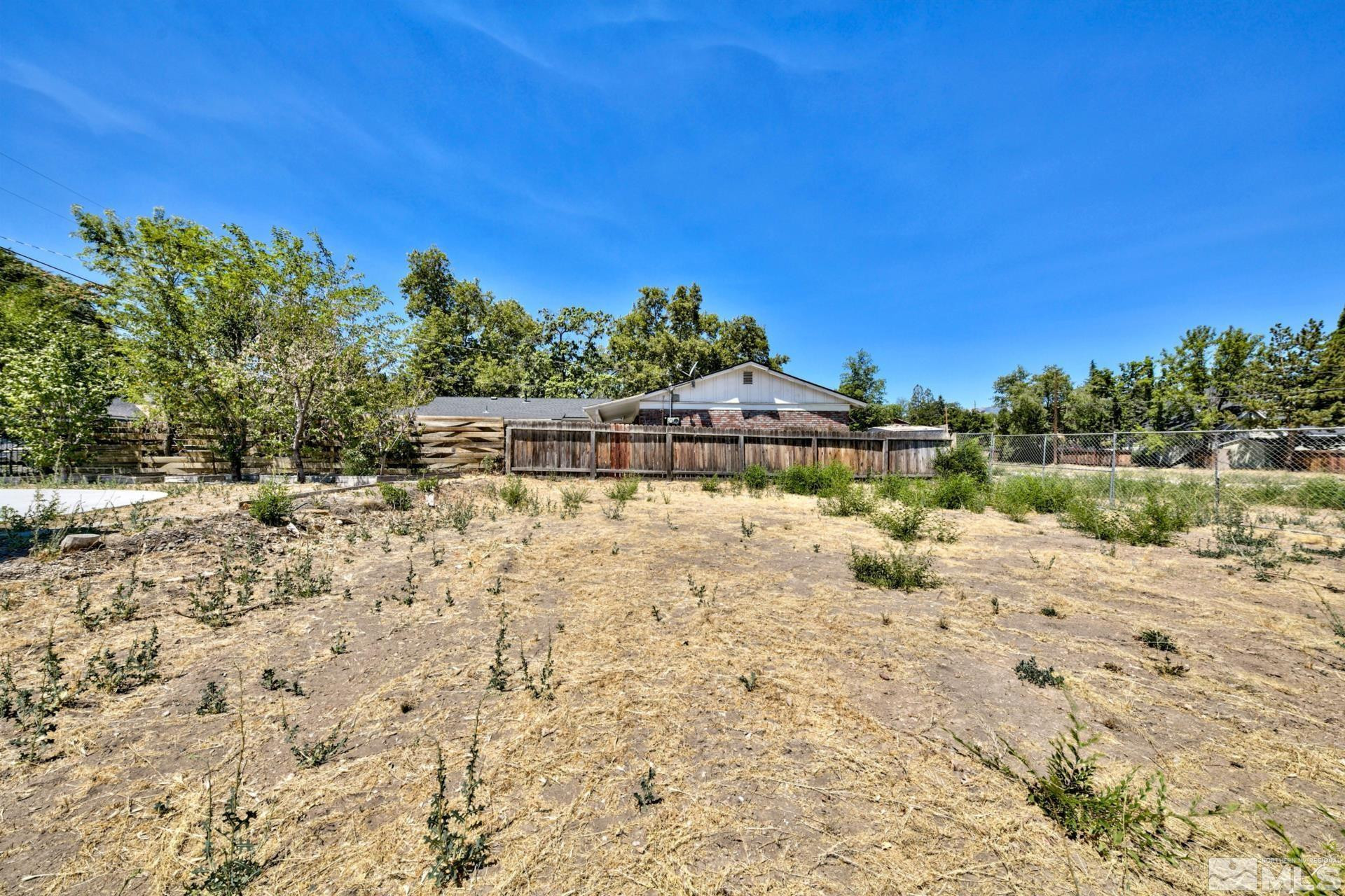 1587 Plumas Street Reno, NV 89509 - Photo 10 of 13 a view of swimming pool with a yard