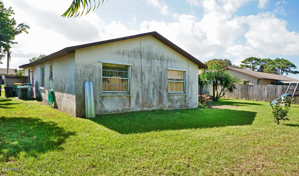 1772 West Shores Road Melbourne, FL 32935 - Photo 20 of 20 Side View