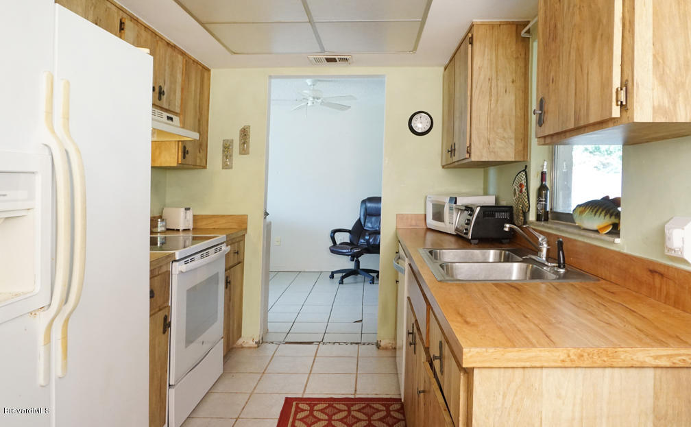 1772 West Shores Road Melbourne, FL 32935 - Photo 8 of 20 Kitchen-2