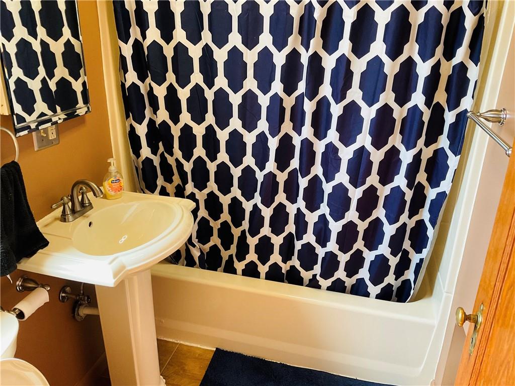 135 Constitution Circle Clairton, PA 15025 - Photo 26 of 40 a bathroom with a sink and a mirror