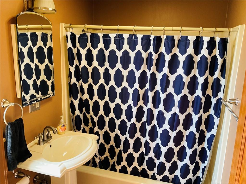 135 Constitution Circle Clairton, PA 15025 - Photo 27 of 40 a bathroom with a sink and a mirror