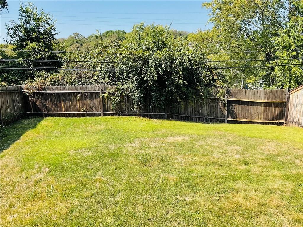 135 Constitution Circle Clairton, PA 15025 - Photo 3 of 40 a swimming pool that is in front of a house