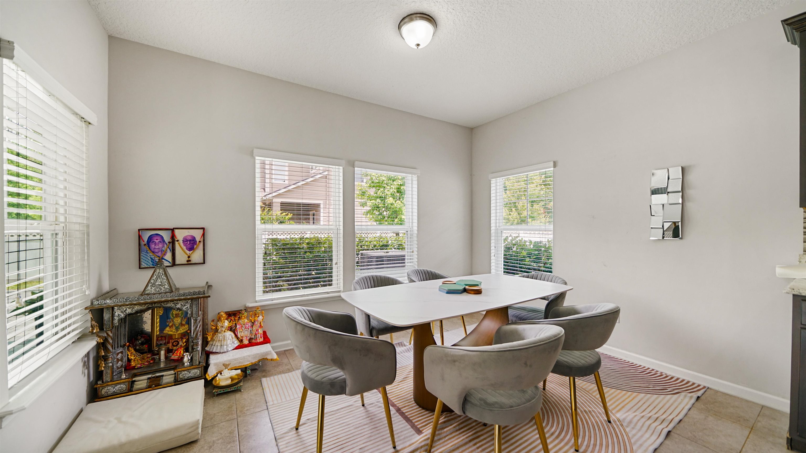 514 Heron Landing Road St. Johns, FL 32259 - Photo 11 of 48 a view of a dining room with furniture window and outside view