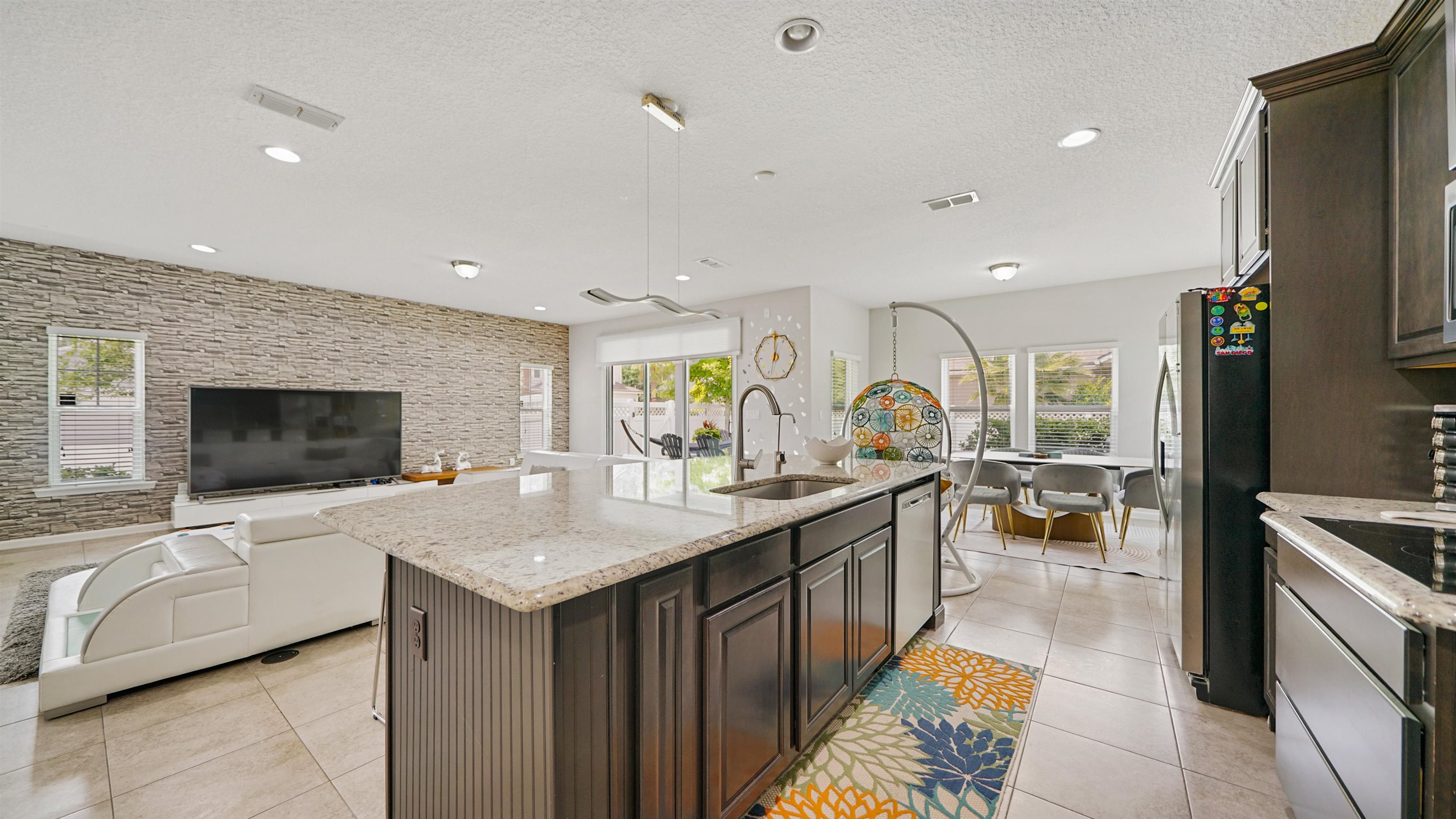 514 Heron Landing Road St. Johns, FL 32259 - Photo 6 of 48 a large kitchen with a large counter top appliances and cabinets