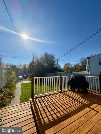 a view of a wooden roof deck