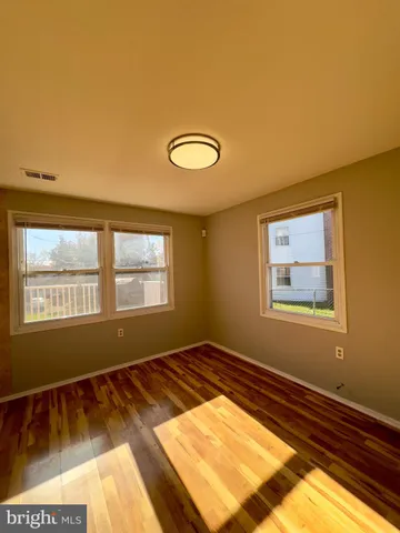 a view of a bathroom with a glass door