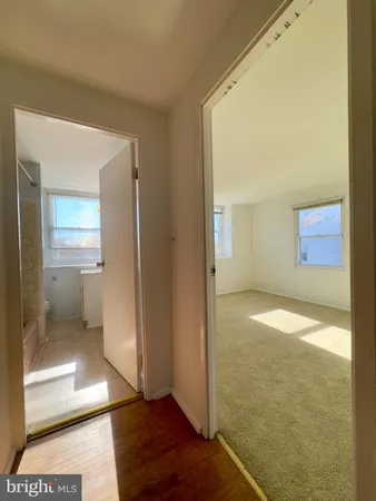 a bathroom with a bathtub and a sink