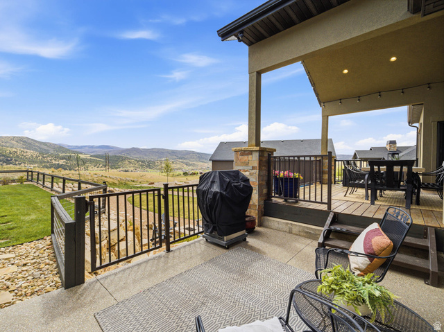 402 Shadow Hill Road Wanship, UT 84017 - Photo 75 of 90 View of patio / terrace featuring outdoor dining area, a grill, and a deck with mountain view