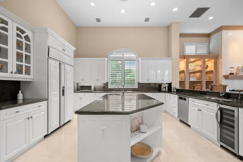 a dining room with furniture window and outside view
