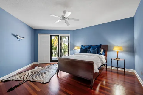 a dining room with furniture and a garden