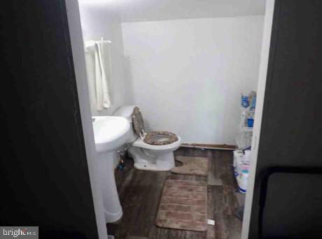 2821 West 3rd Street Chester, PA 19013 - Photo 7 of 9 a bathroom with a toilet and a mirror