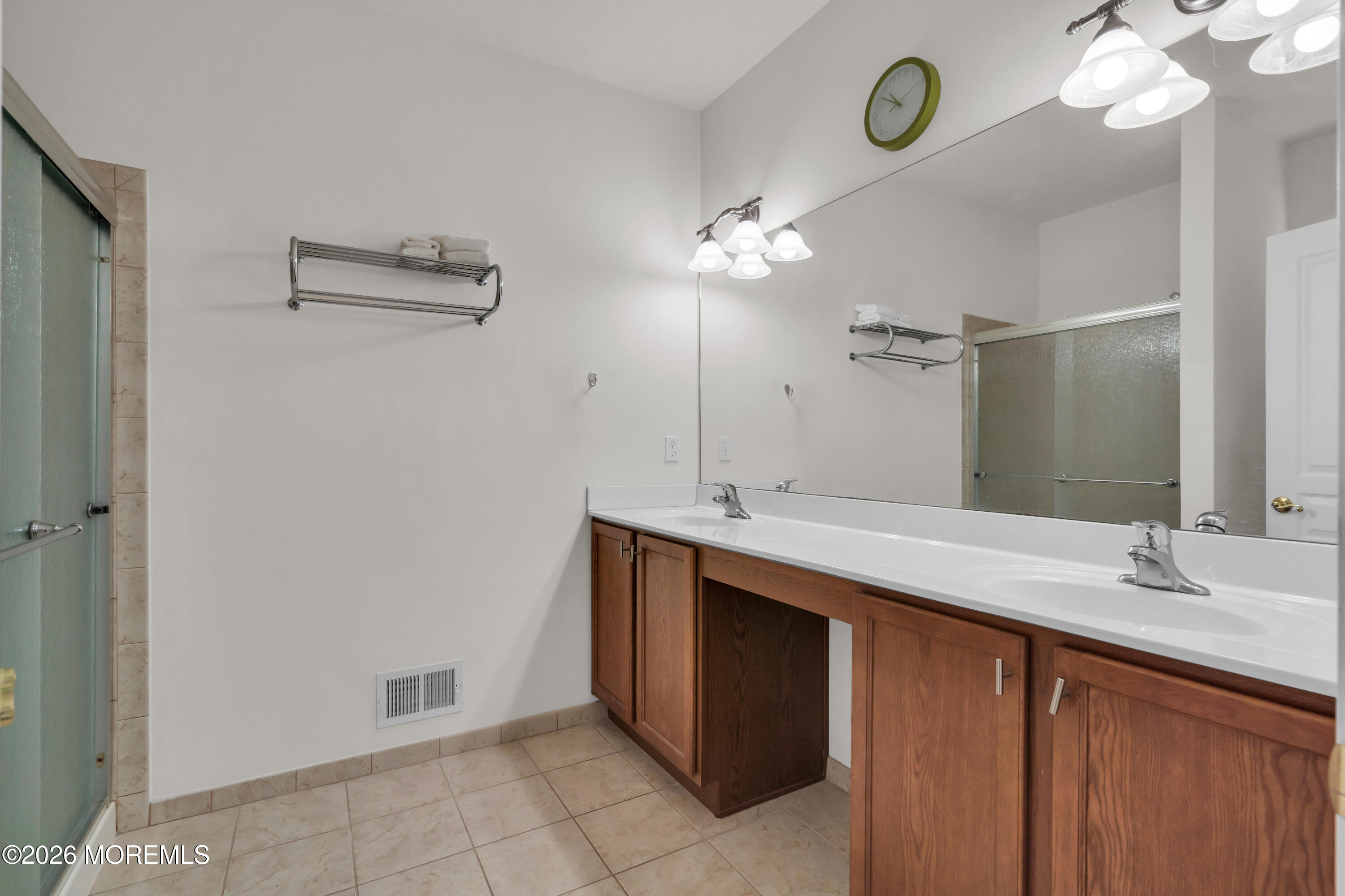 2 Daffodil Drive Little Egg Harbor, NJ 08087 - Photo 11 of 37 a bathroom with a sink vanity and a mirror