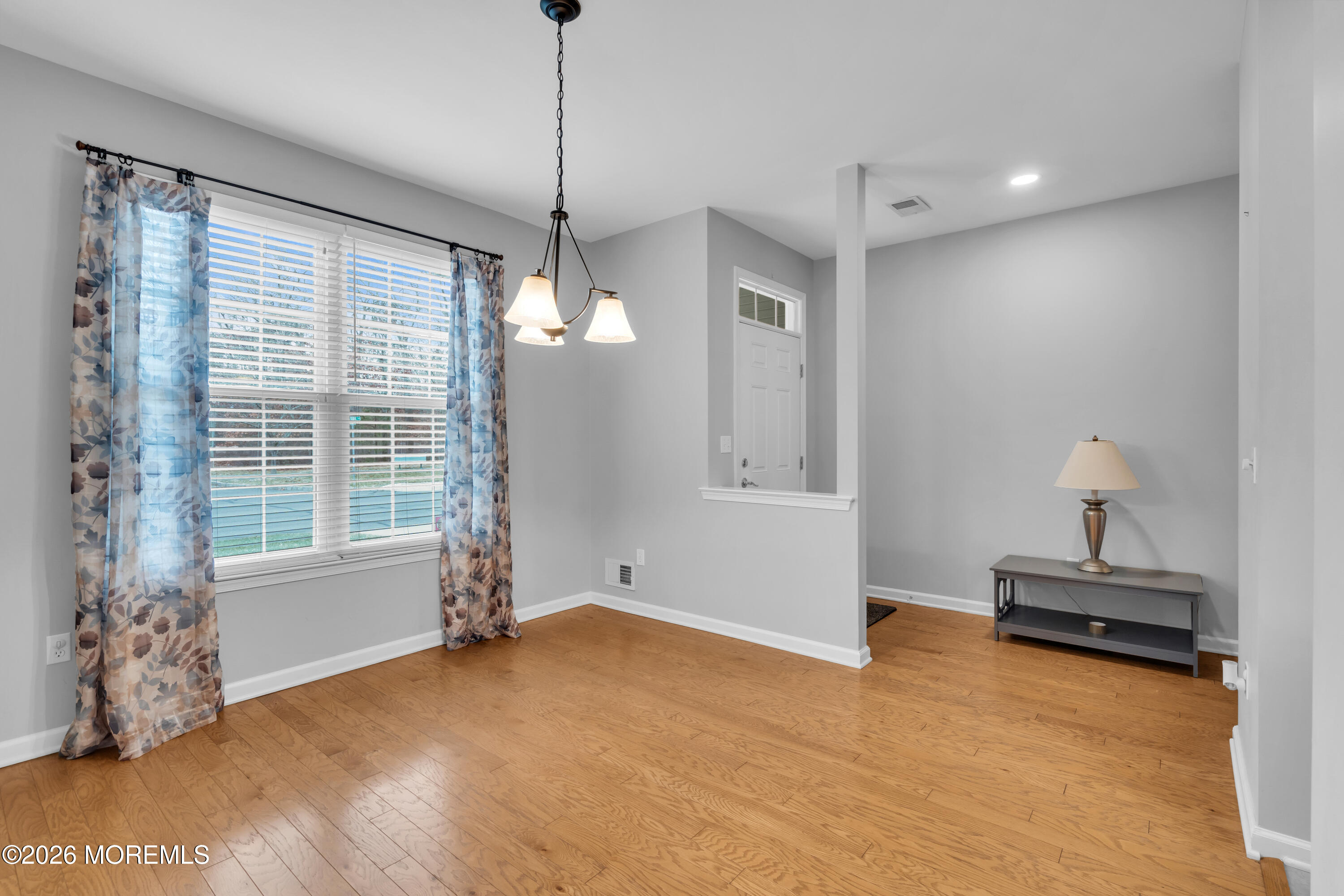 2 Daffodil Drive Little Egg Harbor, NJ 08087 - Photo 19 of 37 a view of empty room with wooden floor and fan