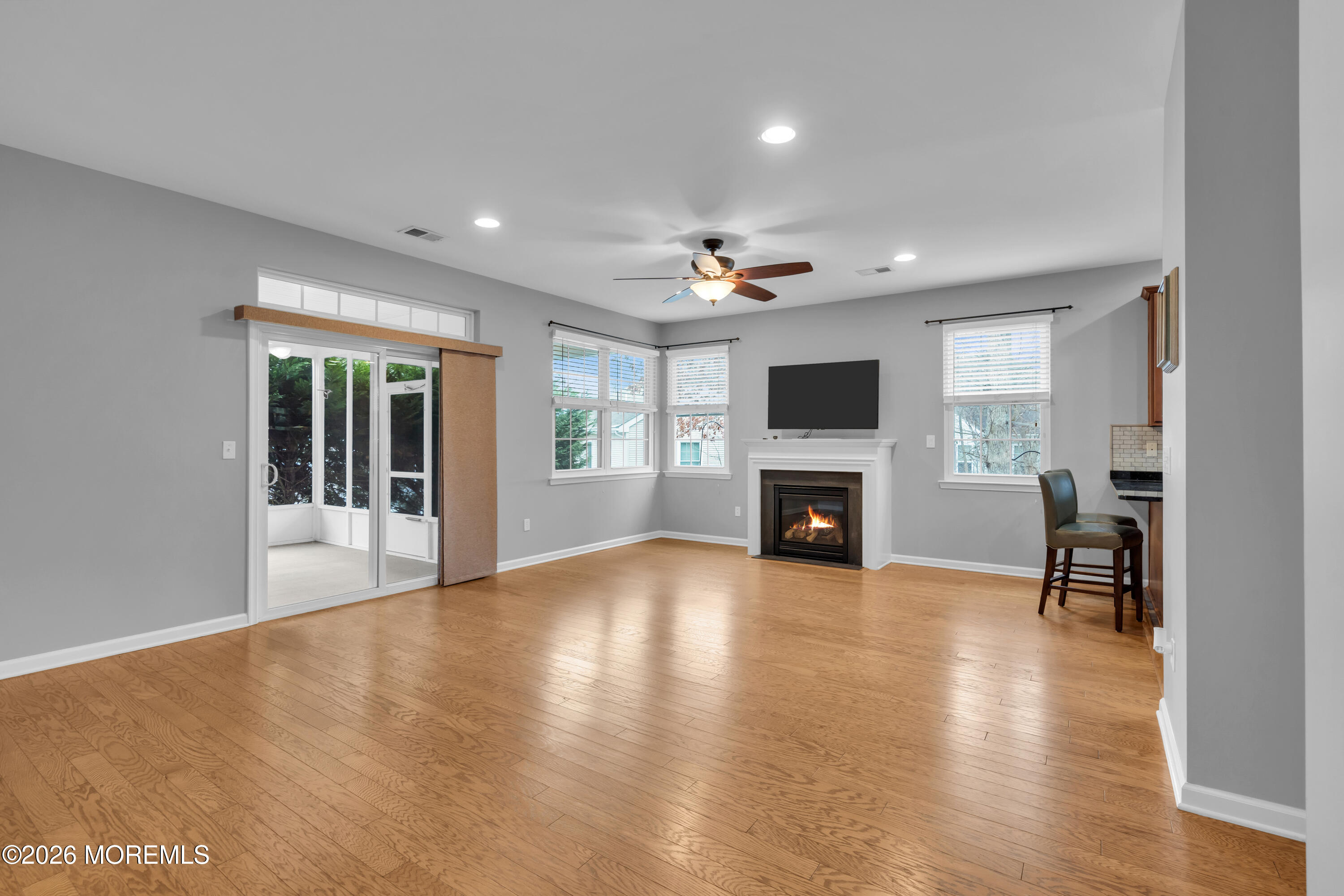 2 Daffodil Drive Little Egg Harbor, NJ 08087 - Photo 22 of 37 a view of a livingroom with a fireplace and window