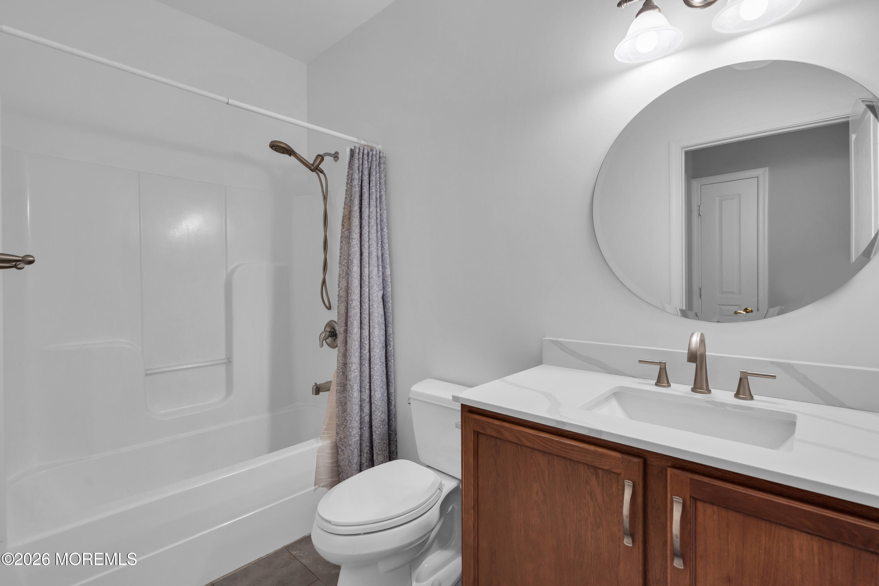 2 Daffodil Drive Little Egg Harbor, NJ 08087 - Photo 27 of 37 a bathroom with a sink toilet vanity and shower