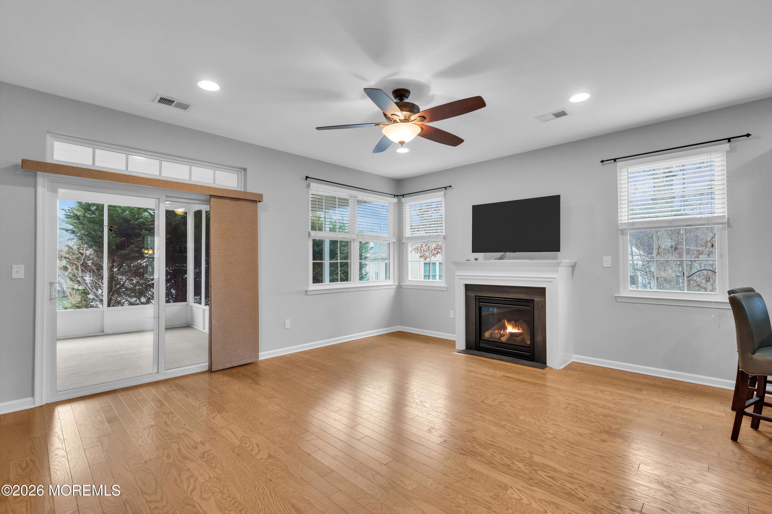 2 Daffodil Drive Little Egg Harbor, NJ 08087 - Photo 3 of 37 a living room with furniture and a fireplace
