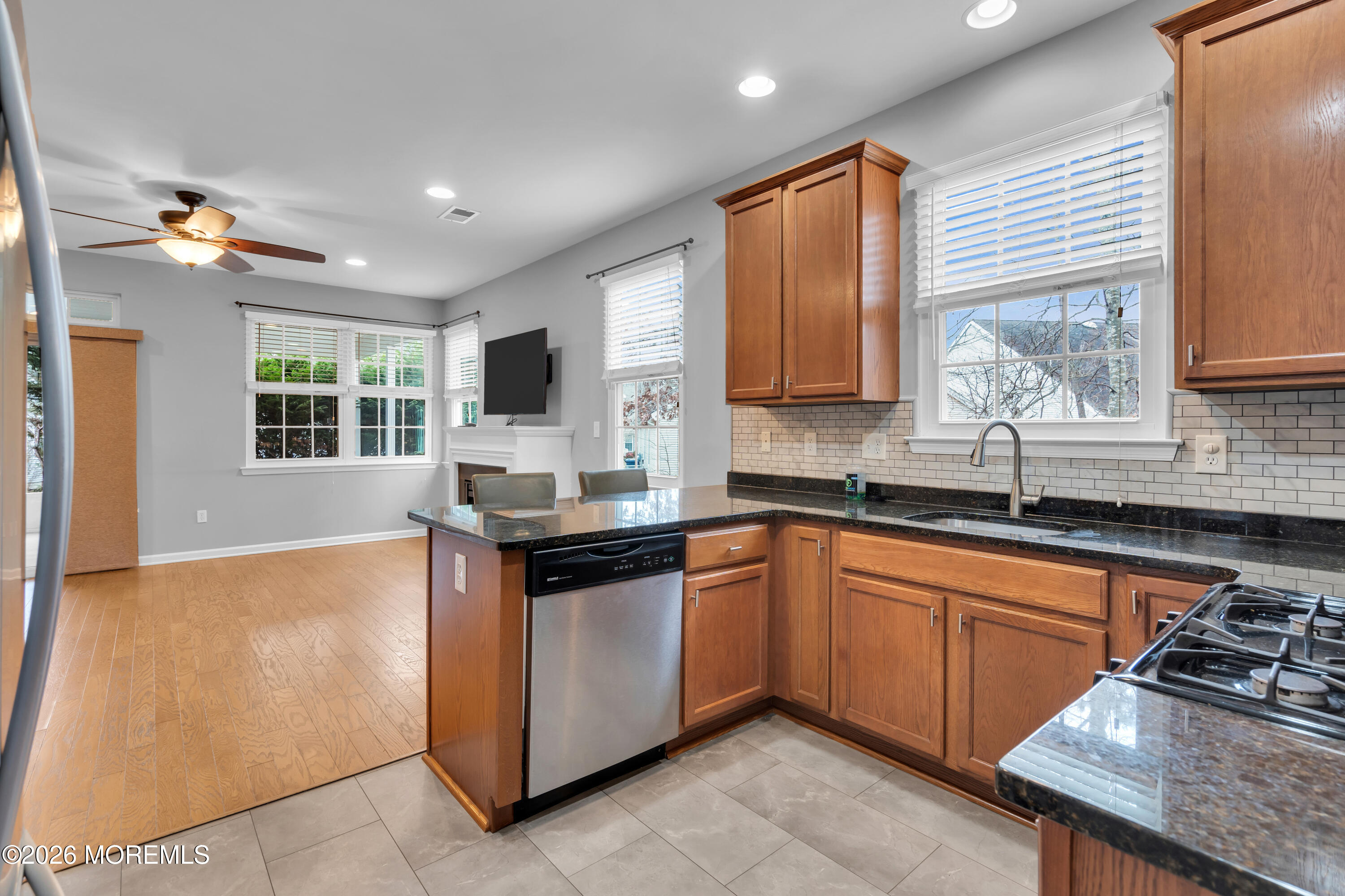 2 Daffodil Drive Little Egg Harbor, NJ 08087 - Photo 5 of 37 a kitchen with granite countertop a sink stove and cabinets