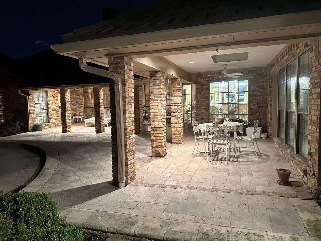 5321 Bent Tree Drive Dallas, TX 75248 - Photo 8 of 9 a view of a livingroom with furniture and floor to ceiling window