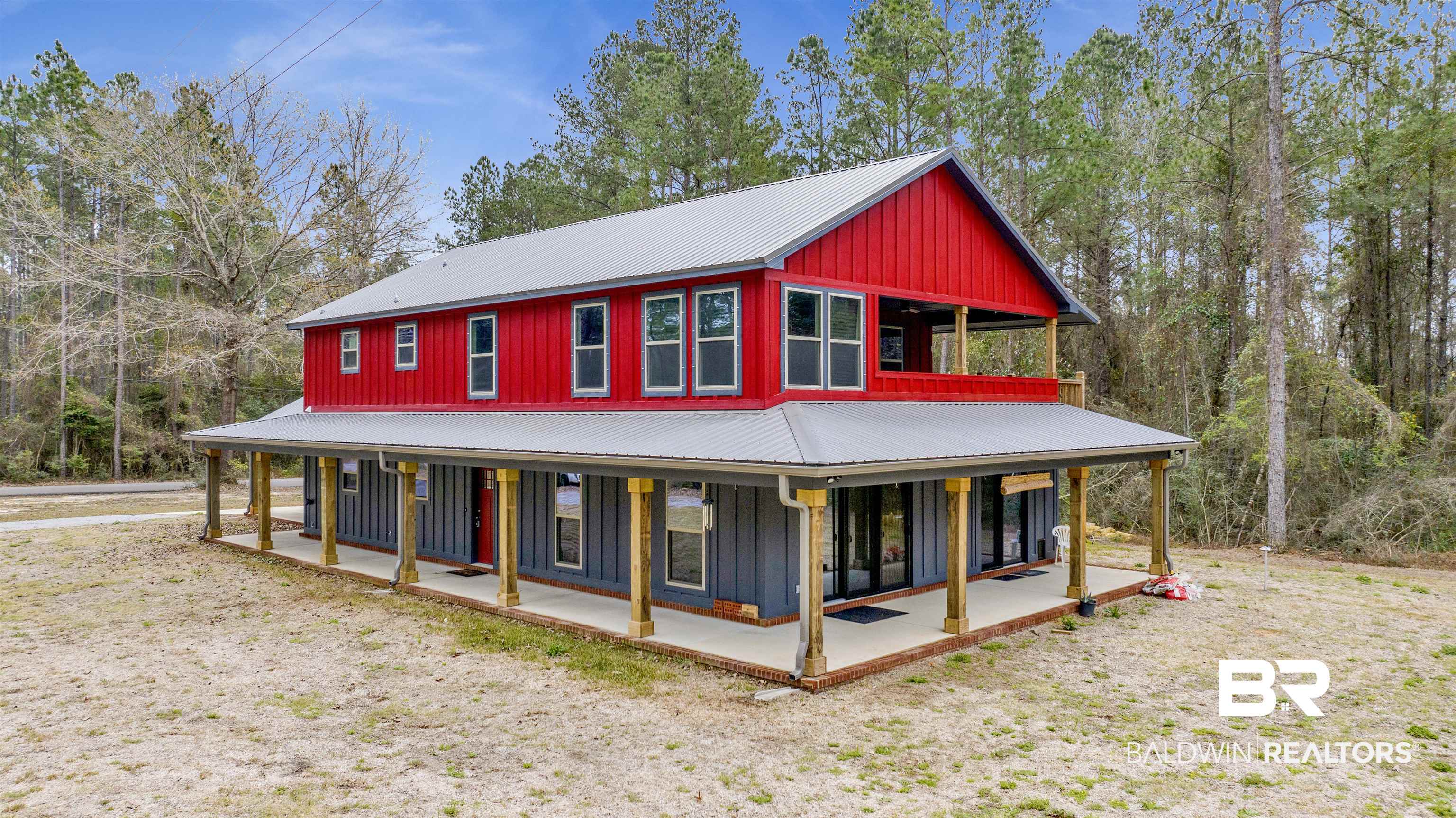 36397 Alexandria Trail Stapleton, AL 36578 - Photo 14 of 65 Exterior space with a metal roof, covered porch, and board and batten siding