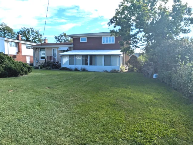 a view of a yard in front of a house