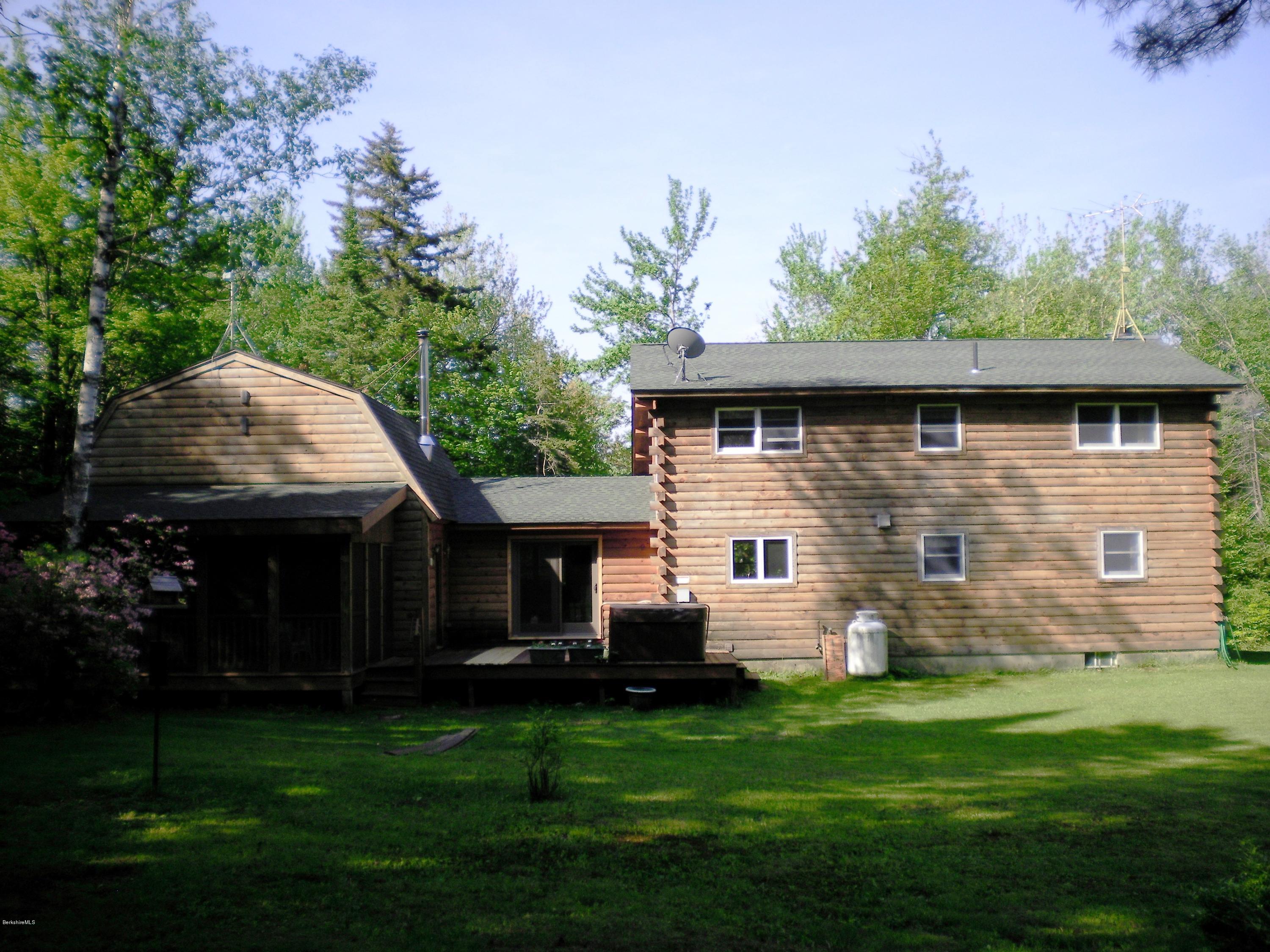 46 West Main Road Peru, MA 01235 - Photo 2 of 29 a front view of house with yard and green space