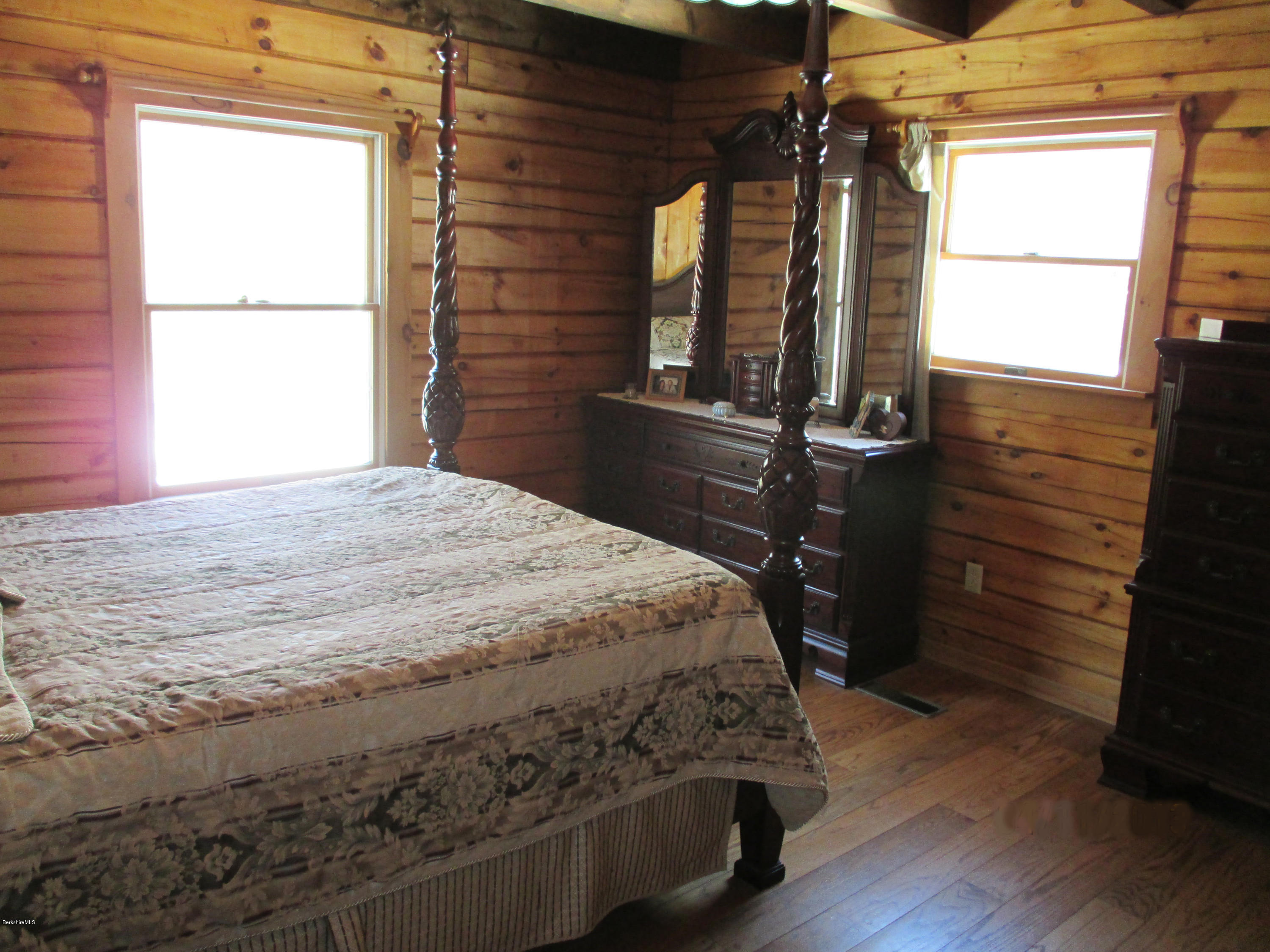 46 West Main Road Peru, MA 01235 - Photo 17 of 29 a bedroom with a bed window and mirror