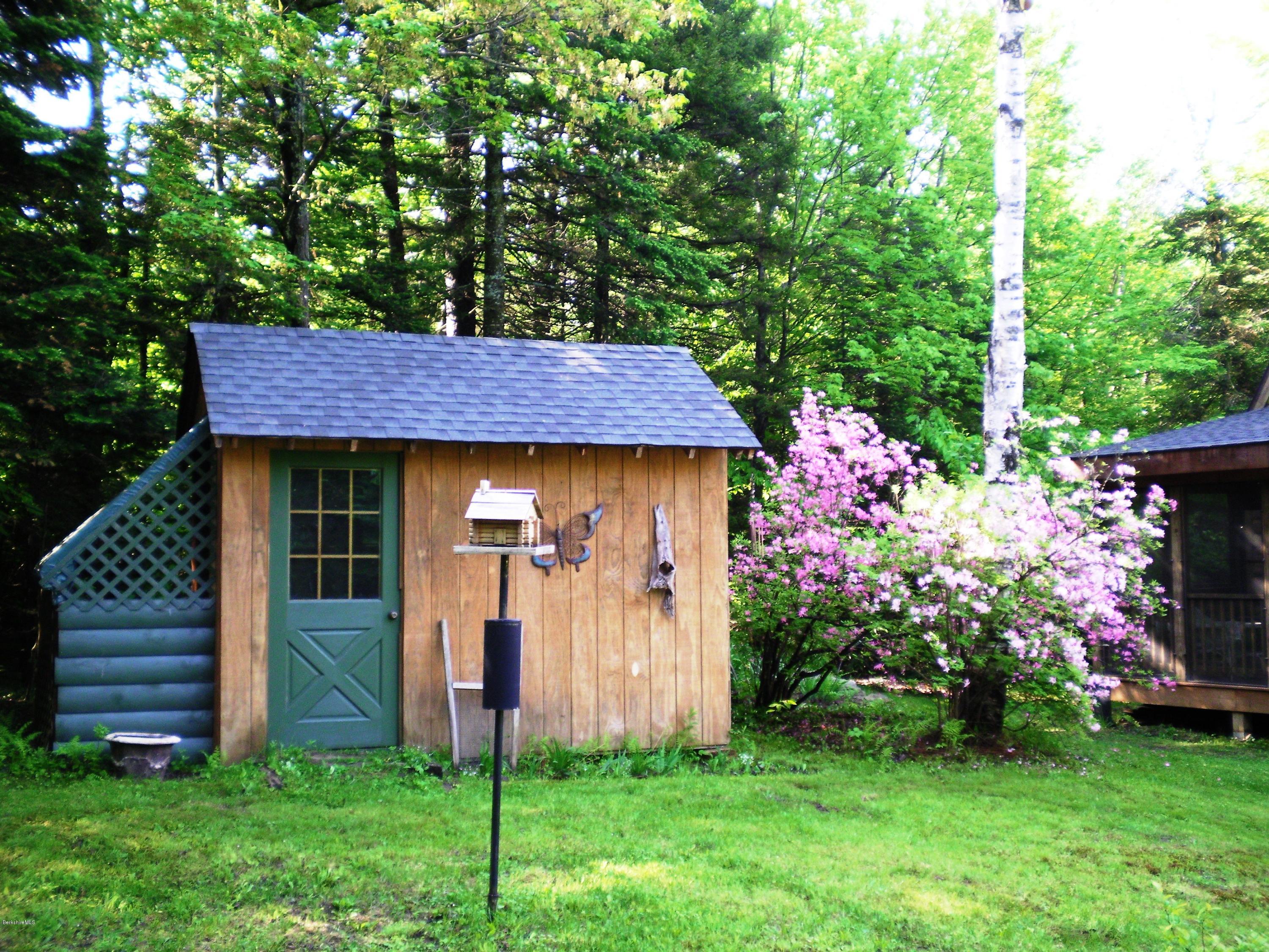 46 West Main Road Peru, MA 01235 - Photo 3 of 29 a view of a house with a yard plants and large tree