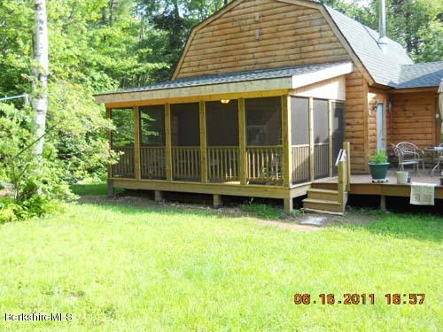 46 West Main Road Peru, MA 01235 - Photo 4 of 29 a view of a house with a backyard