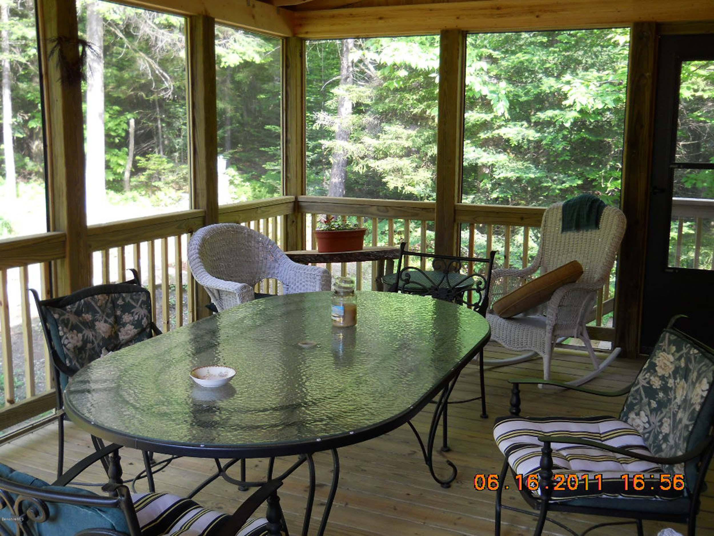 46 West Main Road Peru, MA 01235 - Photo 5 of 29 a view of a dining room with furniture window and wooden floor