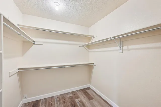 a view of an empty walk in closet