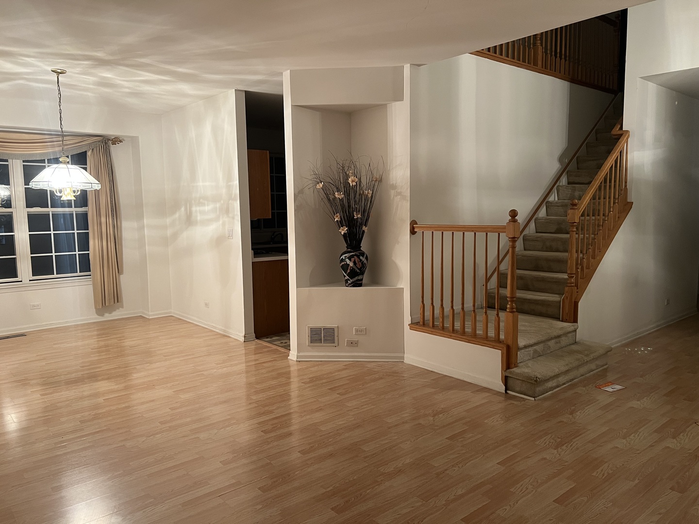 524 East Knox Street Palatine, IL 60074 - Photo 4 of 13 wooden floor in a hall with a window