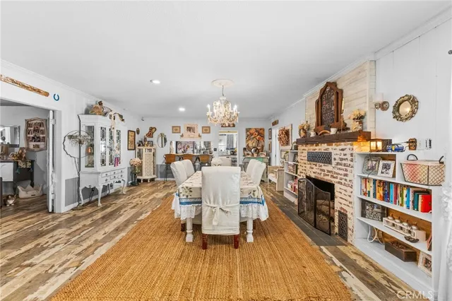 a kitchen filled with stainless steel appliances granite countertop a refrigerator and a stove