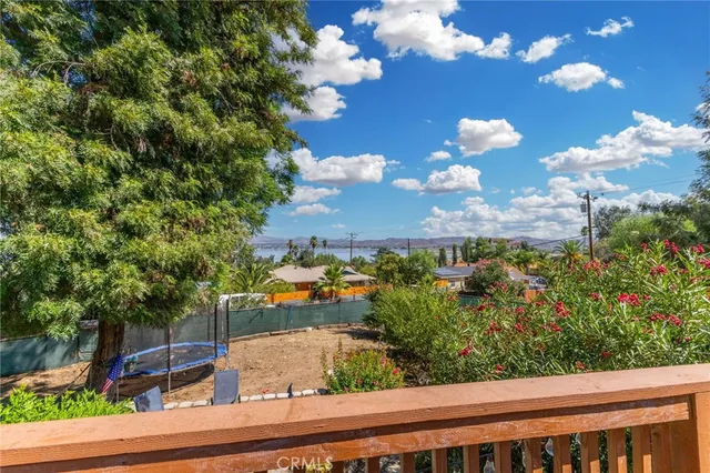 a bed room with a bed and a window