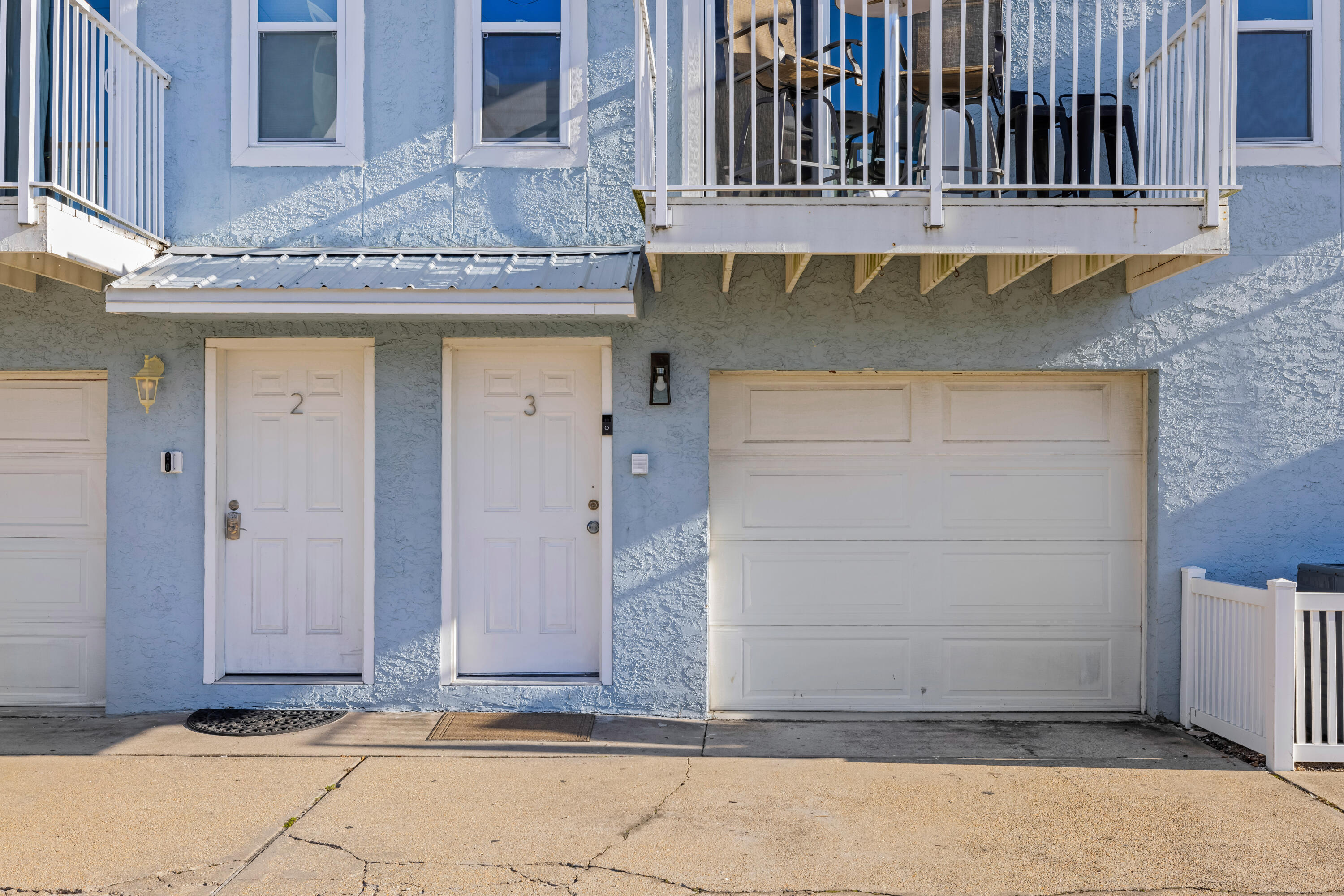 22 Moreno Point Road, Unit 3 Destin, FL 32541 - Photo 6 of 45 a front view of a building
