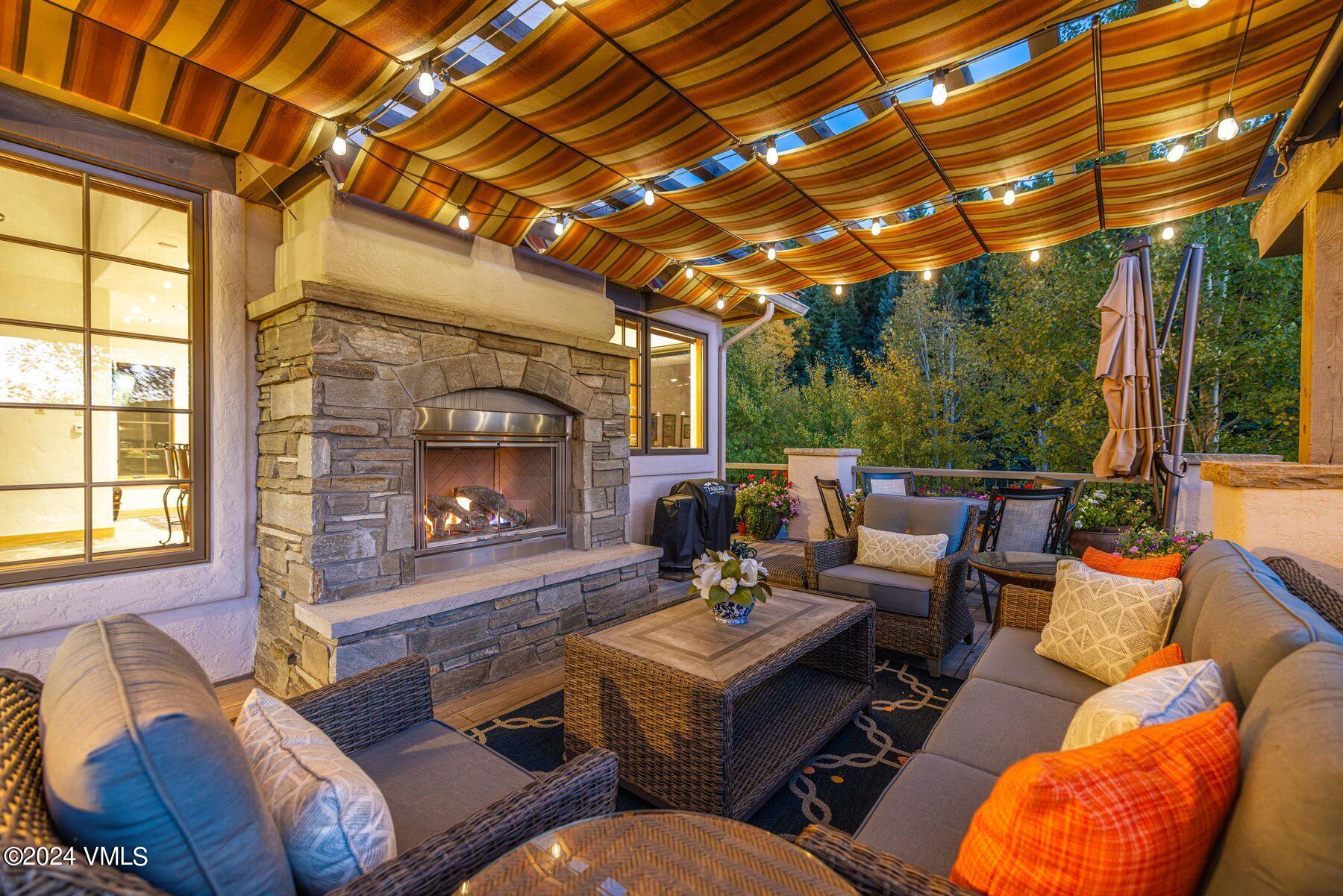 319 Granada Glen Road Edwards, CO 81632 - Photo 15 of 43 a outdoor living space with furniture and garden view