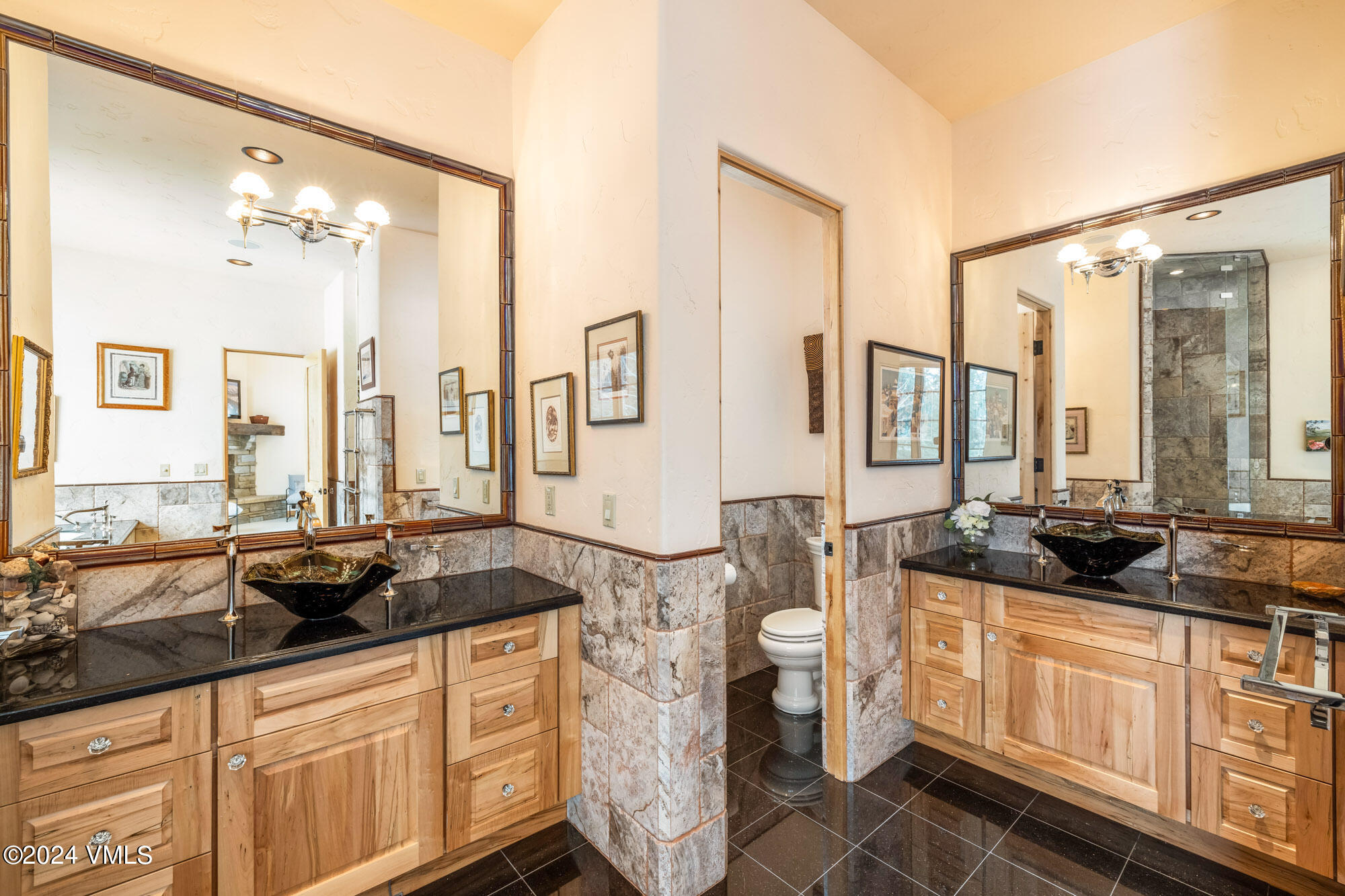319 Granada Glen Road Edwards, CO 81632 - Photo 22 of 43 a spacious bathroom with sinks mirror and a shower